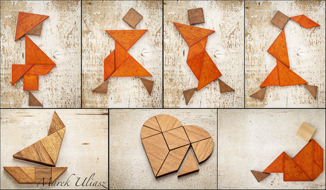 Tangram abstract figures on weathered barn wood